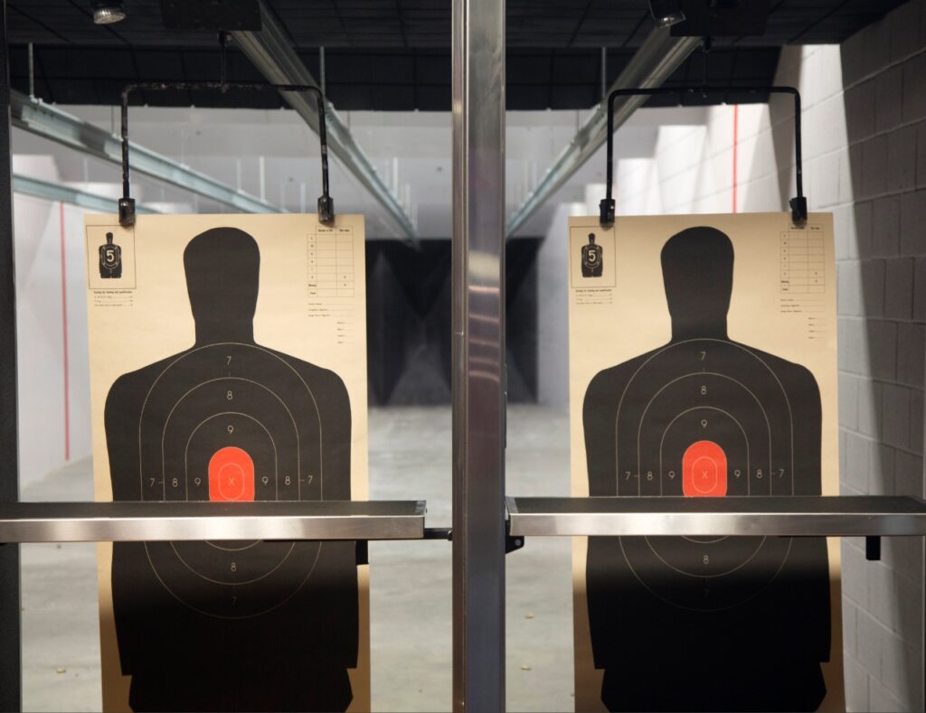 Shooter practicing handgun fundamentals at an indoor shooting range in Sarasota