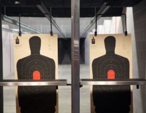 Shooter practicing handgun fundamentals at an indoor shooting range in Sarasota