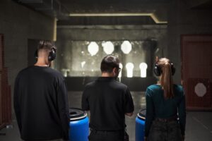 Shooter practicing gun range etiquette in Sarasota at an indoor shooting range