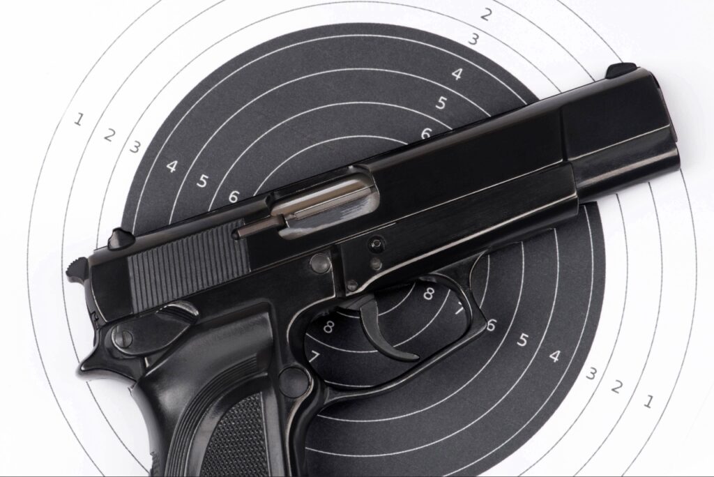 Shooter practicing handgun accuracy in Sarasota at an indoor shooting range