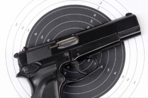 Shooter practicing handgun accuracy in Sarasota at an indoor shooting range