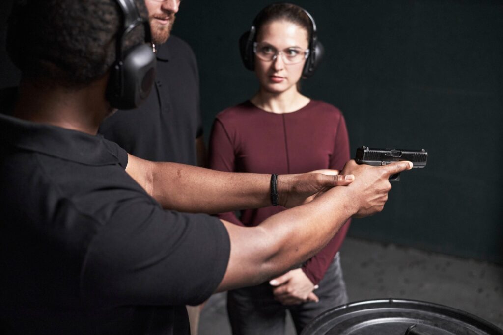 Shooter demonstrating proper foot positioning for a handgun shooting stance in Sarasota