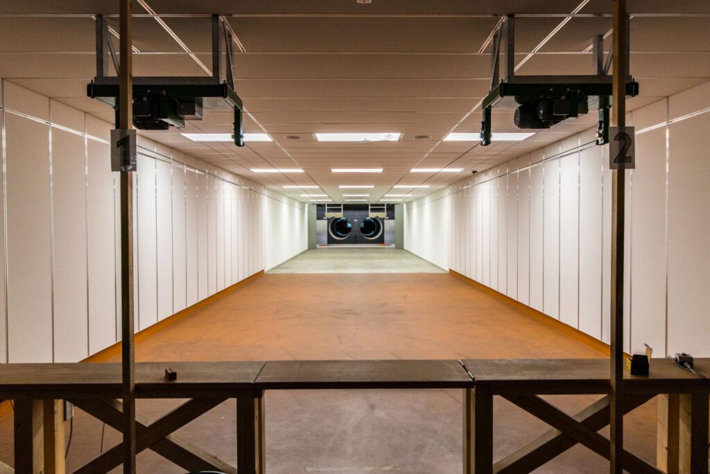 Indoor shooting range facility for women attending firearm training or recreational range sessions in Sarasota