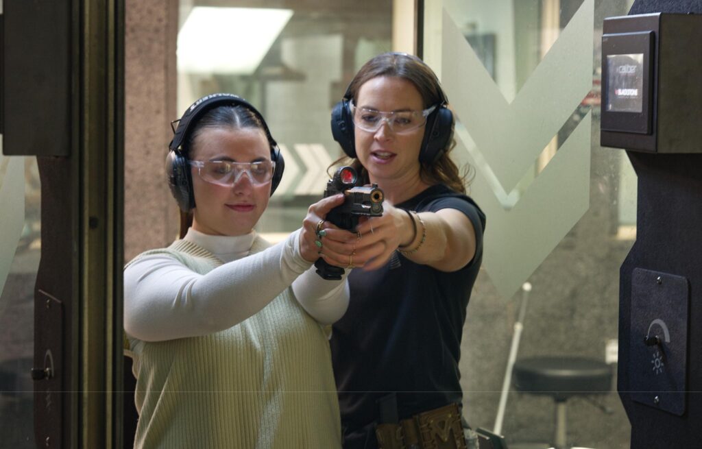 Women enjoying recreational range time at an indoor shooting facility in Sarasota